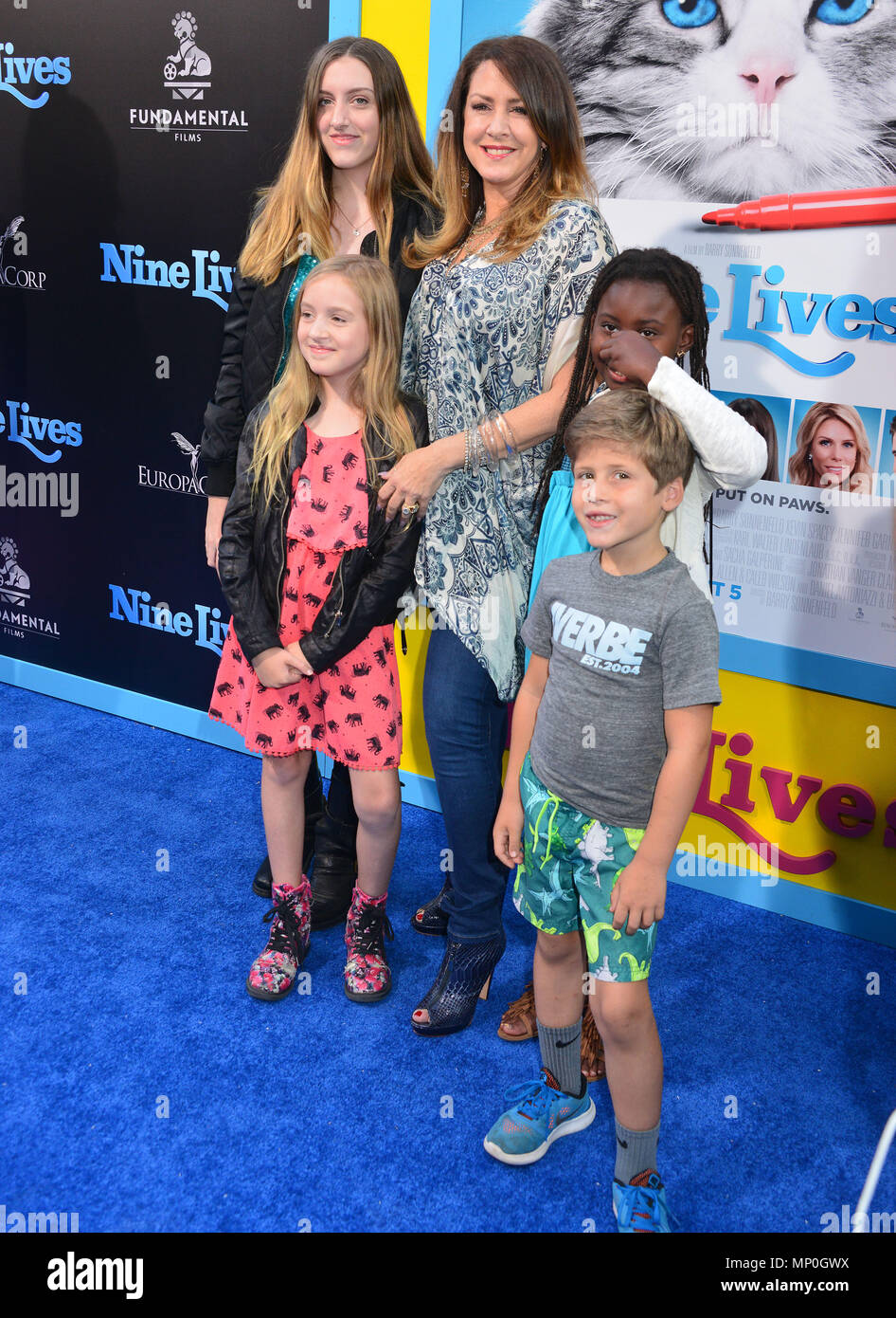 Joely Fisher and kids  at the Nine Lives Premiere at the TCL Chinese Theatre in Los Angeles. August 1st, 2016.Joely Fisher and kids ------------- Red Carpet Event, Vertical, USA, Film Industry, Celebrities,  Photography, Bestof, Arts Culture and Entertainment, Topix Celebrities fashion /  Vertical, Best of, Event in Hollywood Life - California,  Red Carpet and backstage, USA, Film Industry, Celebrities,  movie celebrities, TV celebrities, Music celebrities, Photography, Bestof, Arts Culture and Entertainment,  Topix, vertical,  family from from the year , 2016, inquiry tsuni@Gamma-USA.com Husb Stock Photo