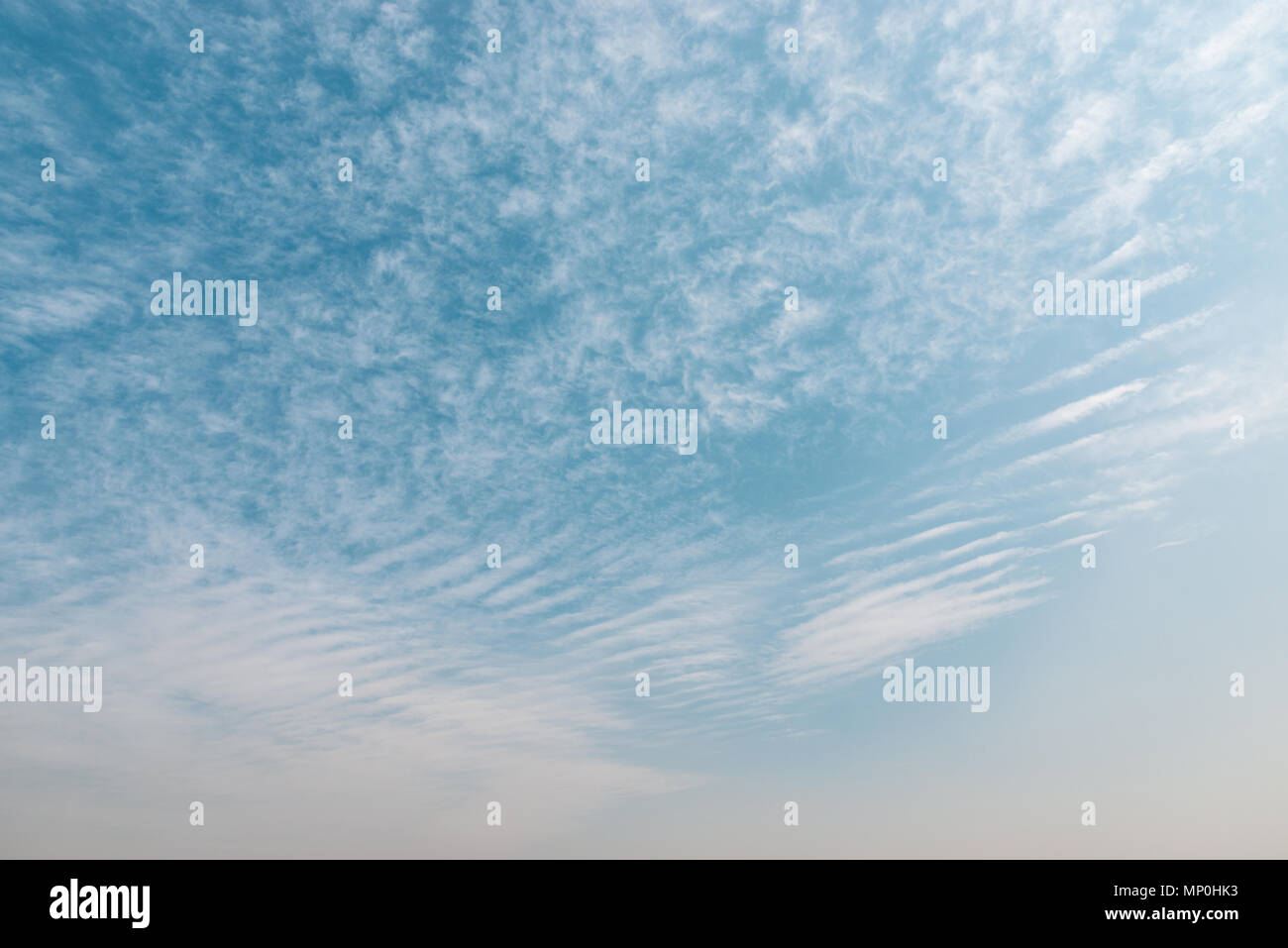 Blue sky with small clouds background Stock Photo