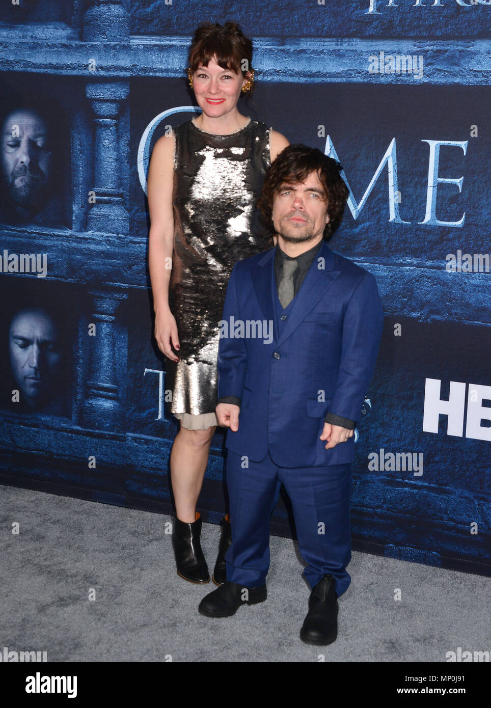 Peter Dinklage, Erica Schmidt 245 arriving at the Game of Thrones at the TCL Chinese Theatre in Los Angeles. April 10, 2016.Peter Dinklage, Erica Schmidt 245 ------------- Red Carpet Event, Vertical, USA, Film Industry, Celebrities,  Photography, Bestof, Arts Culture and Entertainment, Topix Celebrities fashion /  Vertical, Best of, Event in Hollywood Life - California,  Red Carpet and backstage, USA, Film Industry, Celebrities,  movie celebrities, TV celebrities, Music celebrities, Photography, Bestof, Arts Culture and Entertainment,  Topix, vertical,  family from from the year , 2016, inquir Stock Photo