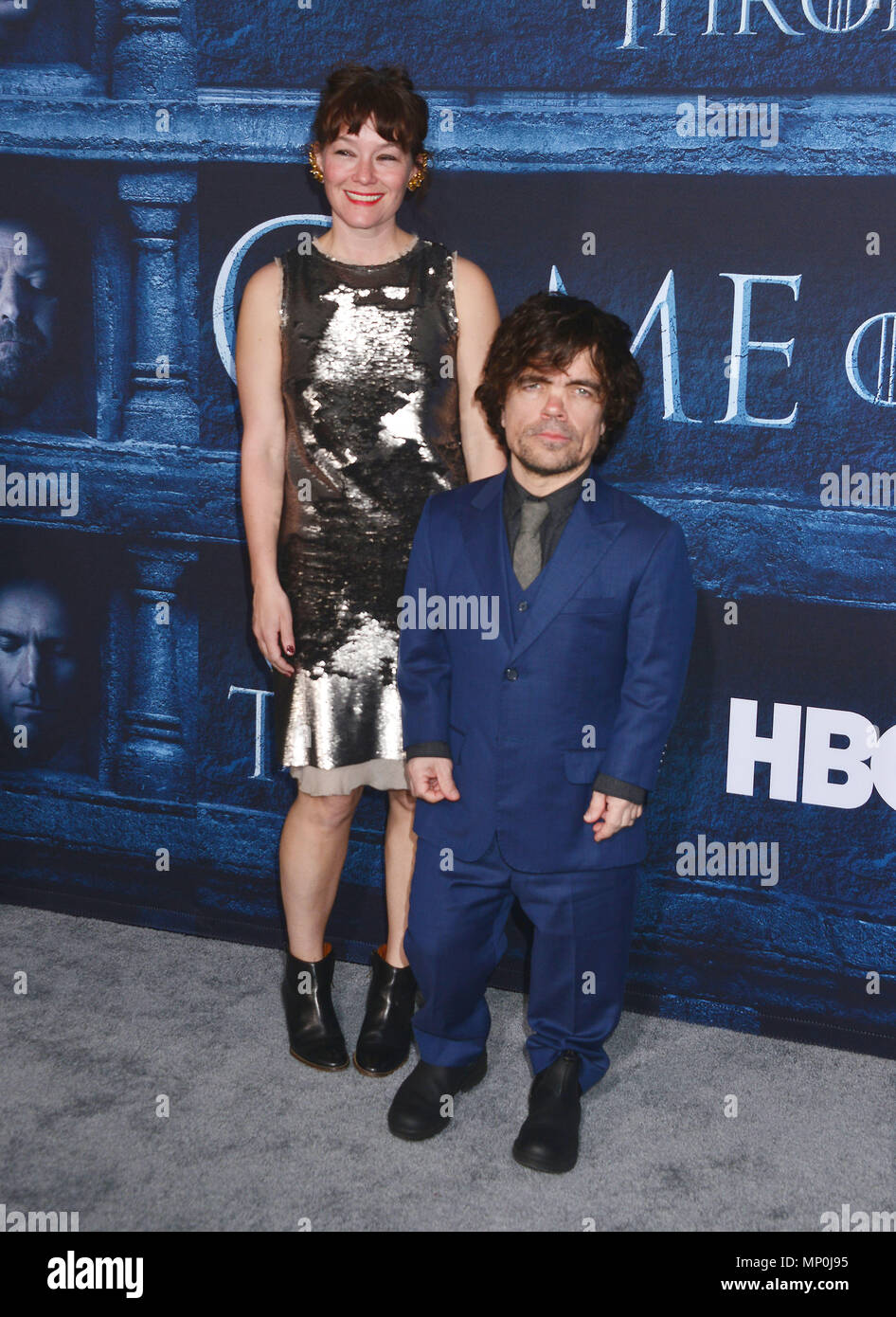 Peter Dinklage, Erica Schmidt 246 arriving at the Game of Thrones at the TCL Chinese Theatre in Los Angeles. April 10, 2016.Peter Dinklage, Erica Schmidt 246 ------------- Red Carpet Event, Vertical, USA, Film Industry, Celebrities,  Photography, Bestof, Arts Culture and Entertainment, Topix Celebrities fashion /  Vertical, Best of, Event in Hollywood Life - California,  Red Carpet and backstage, USA, Film Industry, Celebrities,  movie celebrities, TV celebrities, Music celebrities, Photography, Bestof, Arts Culture and Entertainment,  Topix, vertical,  family from from the year , 2016, inquir Stock Photo