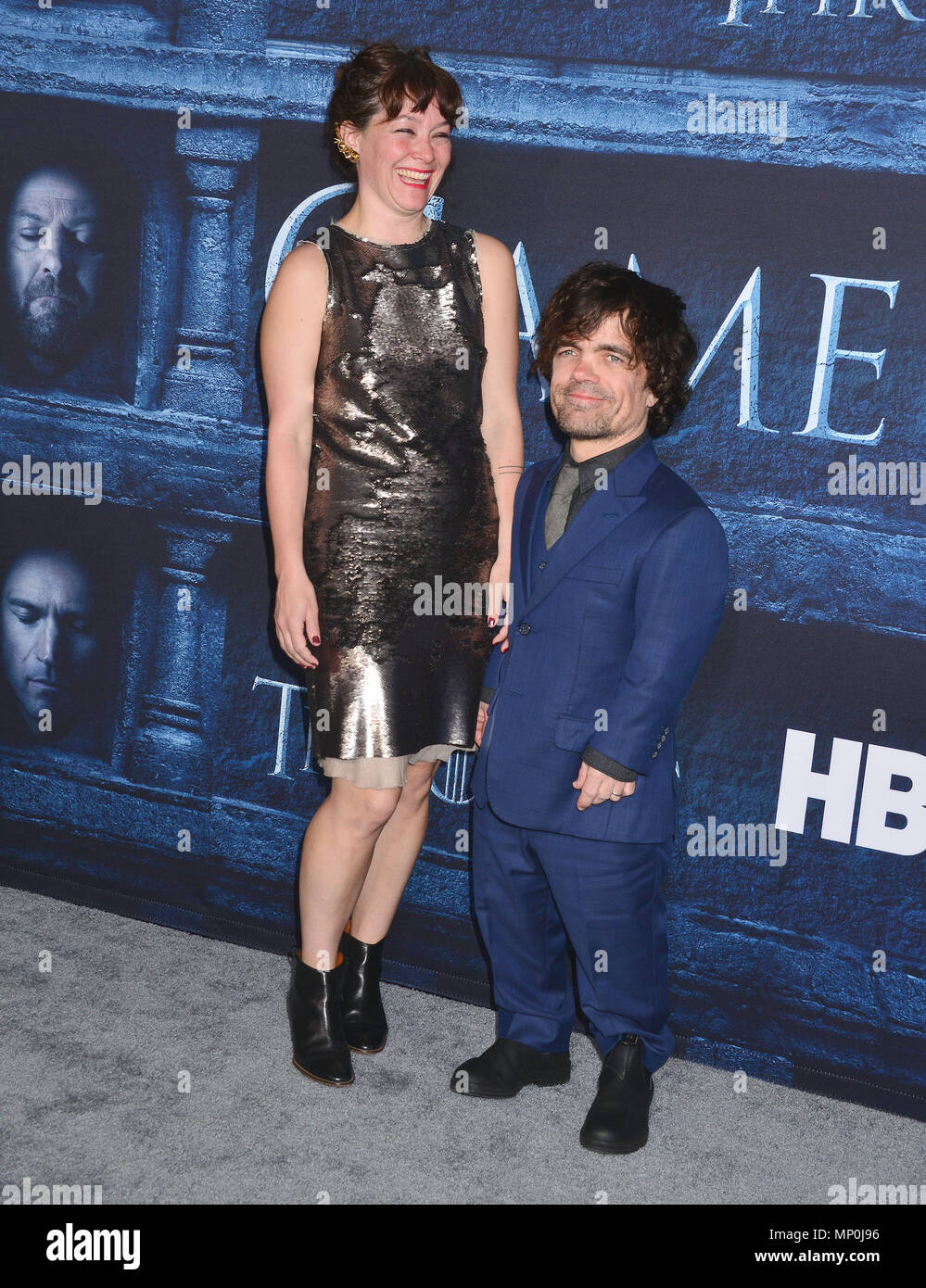 Peter Dinklage, Erica Schmidt 247 arriving at the Game of Thrones at the TCL Chinese Theatre in Los Angeles. April 10, 2016.Peter Dinklage, Erica Schmidt 247 ------------- Red Carpet Event, Vertical, USA, Film Industry, Celebrities,  Photography, Bestof, Arts Culture and Entertainment, Topix Celebrities fashion /  Vertical, Best of, Event in Hollywood Life - California,  Red Carpet and backstage, USA, Film Industry, Celebrities,  movie celebrities, TV celebrities, Music celebrities, Photography, Bestof, Arts Culture and Entertainment,  Topix, vertical,  family from from the year , 2016, inquir Stock Photo