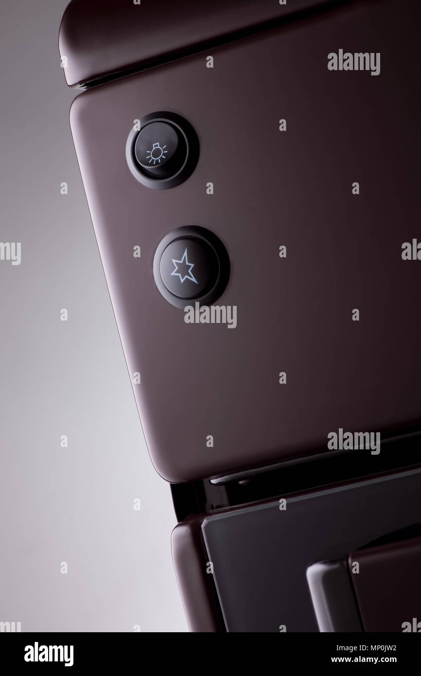 the front part of the modern gas stove with buttons Stock Photo Alamy