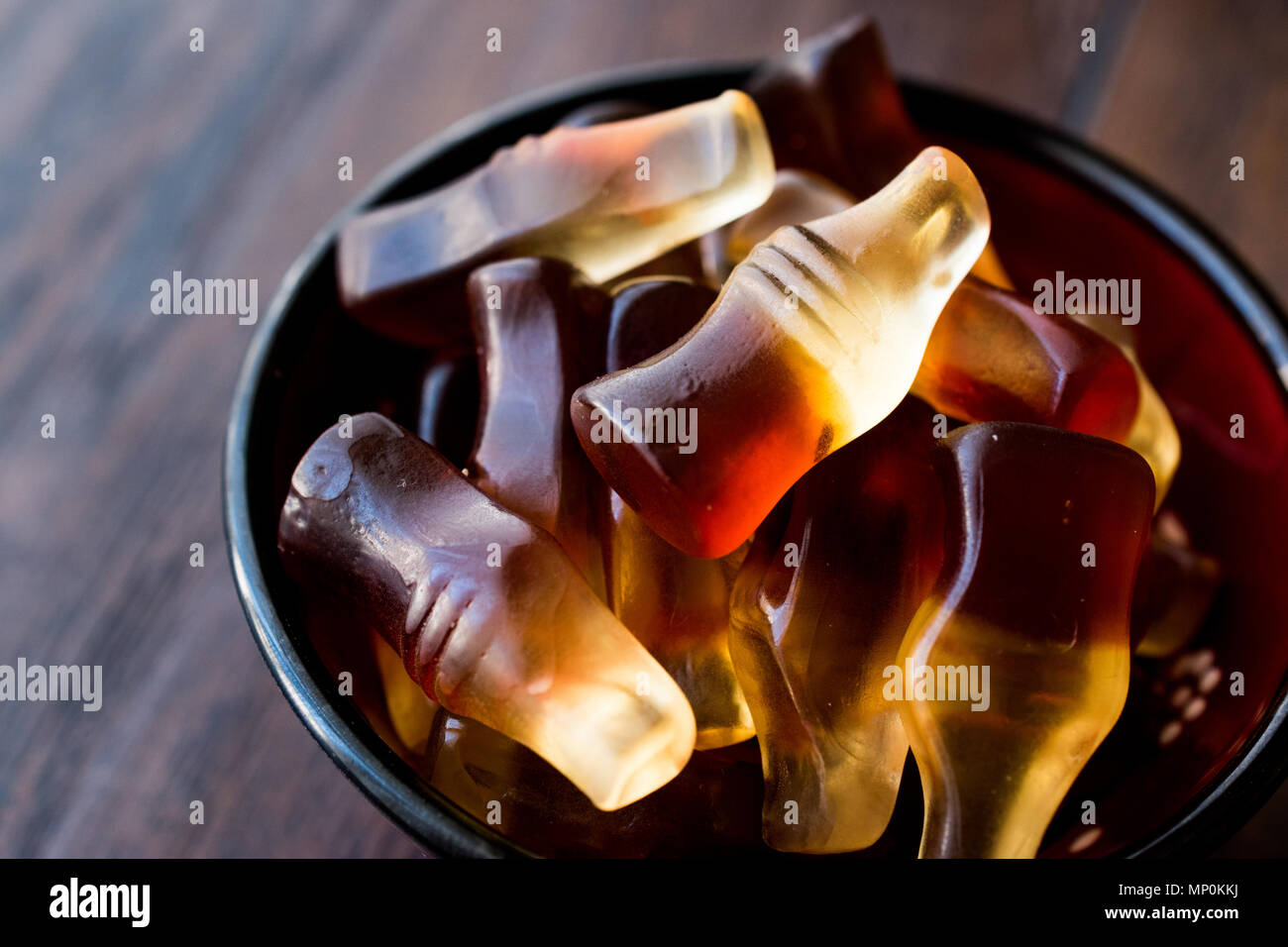 Cola flavored gummy jellies in the shape of bottles. Confectionery ...