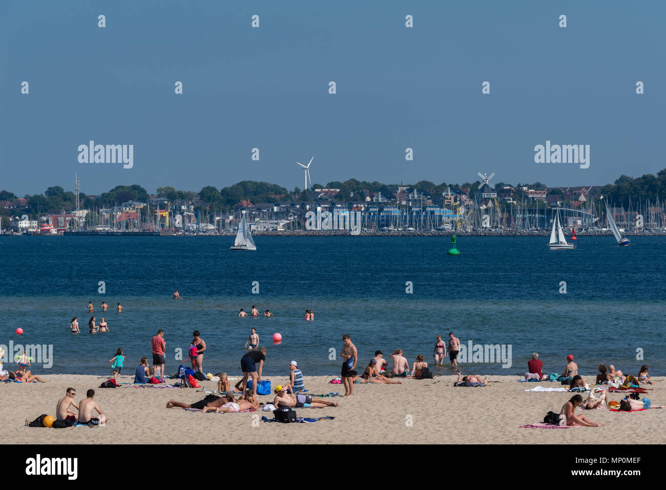 Relaxing on a hot summer day at the beach 'Falkensteiner Strand', Kiel Fjord, Kiel, Germany, Stock Photo