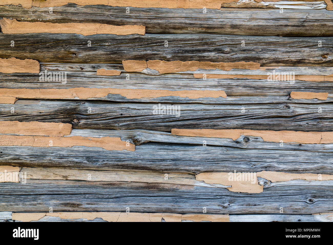 Old Weathered Log Cabin Wall Background Stock Photo