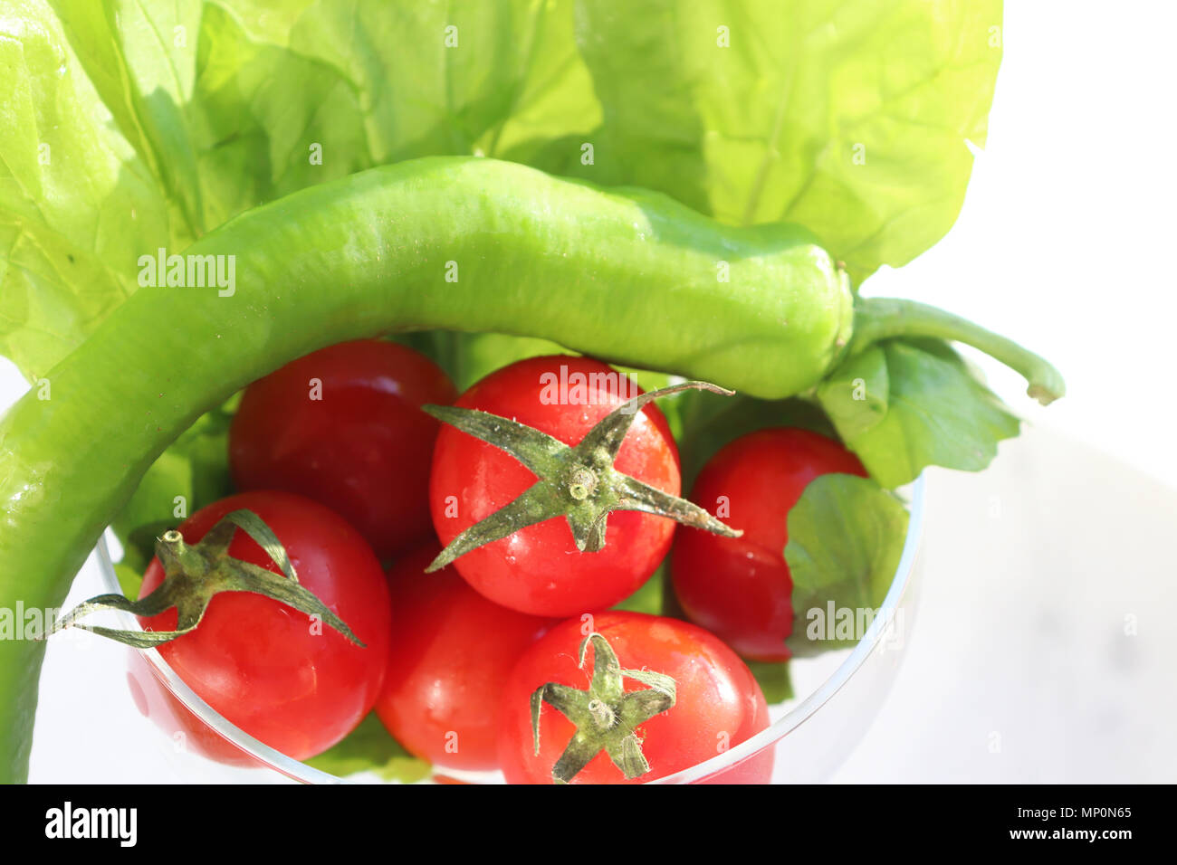 cherry tomatoes on white background Stock Photo