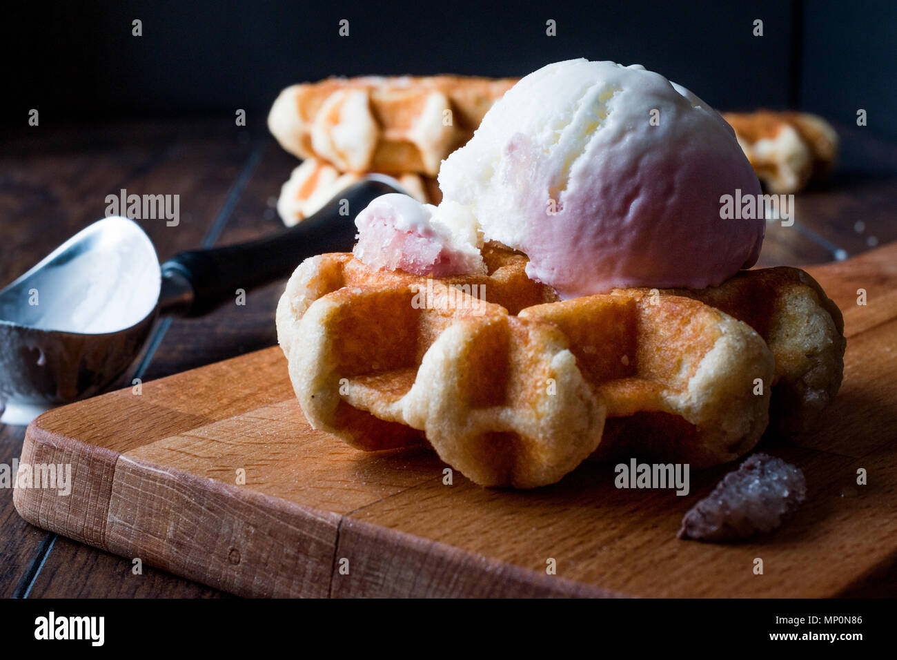 Belgium Waffle with ice cream on wooden surface. Traditional Food Stock ...
