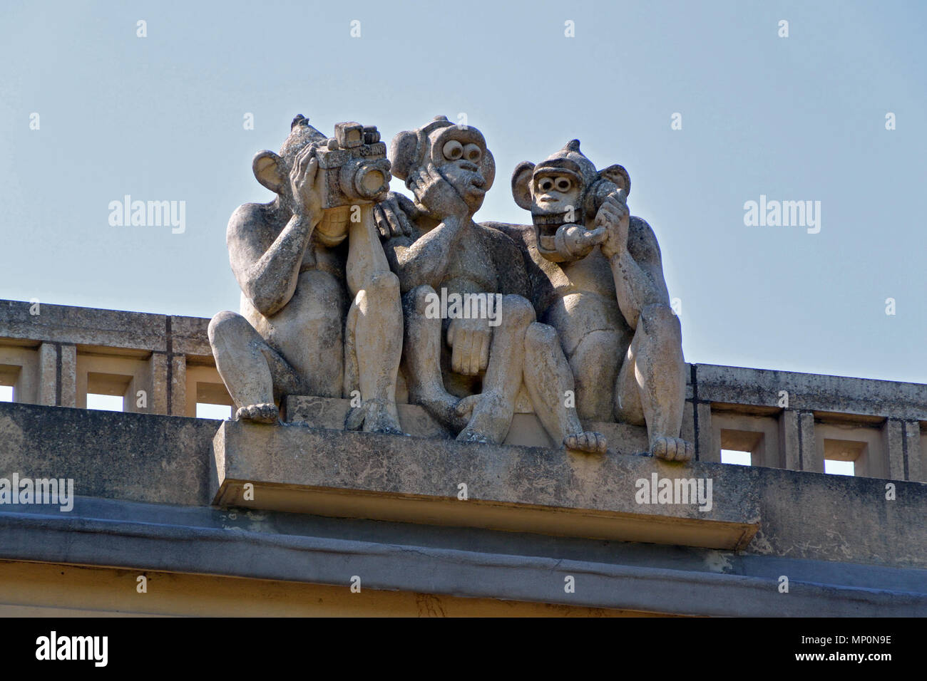 Three Wise Monkeys sculpture on the roof of Waterloo Park Pavilion, Norwich, Norfolk, UK Stock Photo