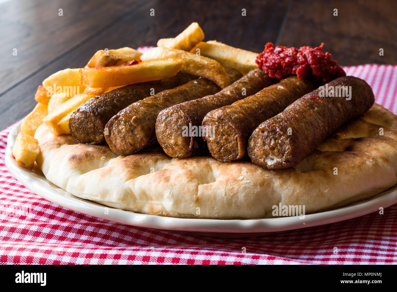 Balkan Cevapcici Kofta or Kofte Kebab with Pide or Pita Bread