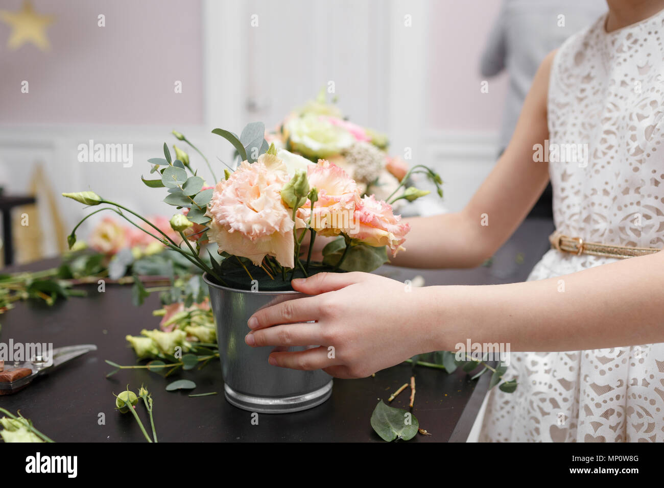 Master class on making bouquets for kids. Spring bouquet in metal ornamental flowerpot. Learning