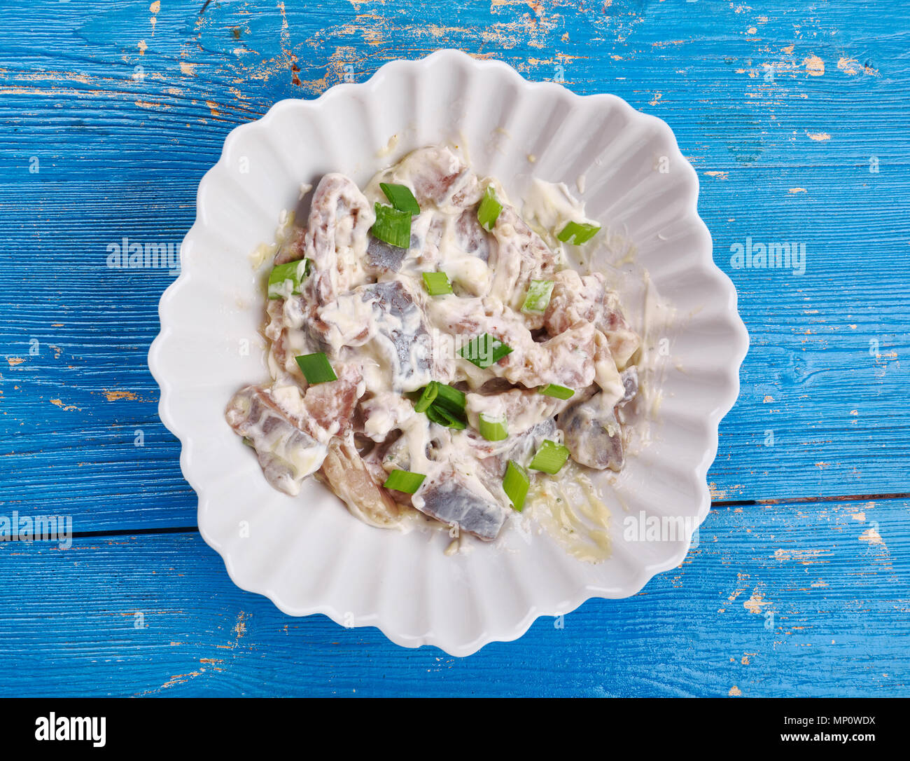Polish Herring in Sour Cream Sledzie smietanie, close up Stock Photo