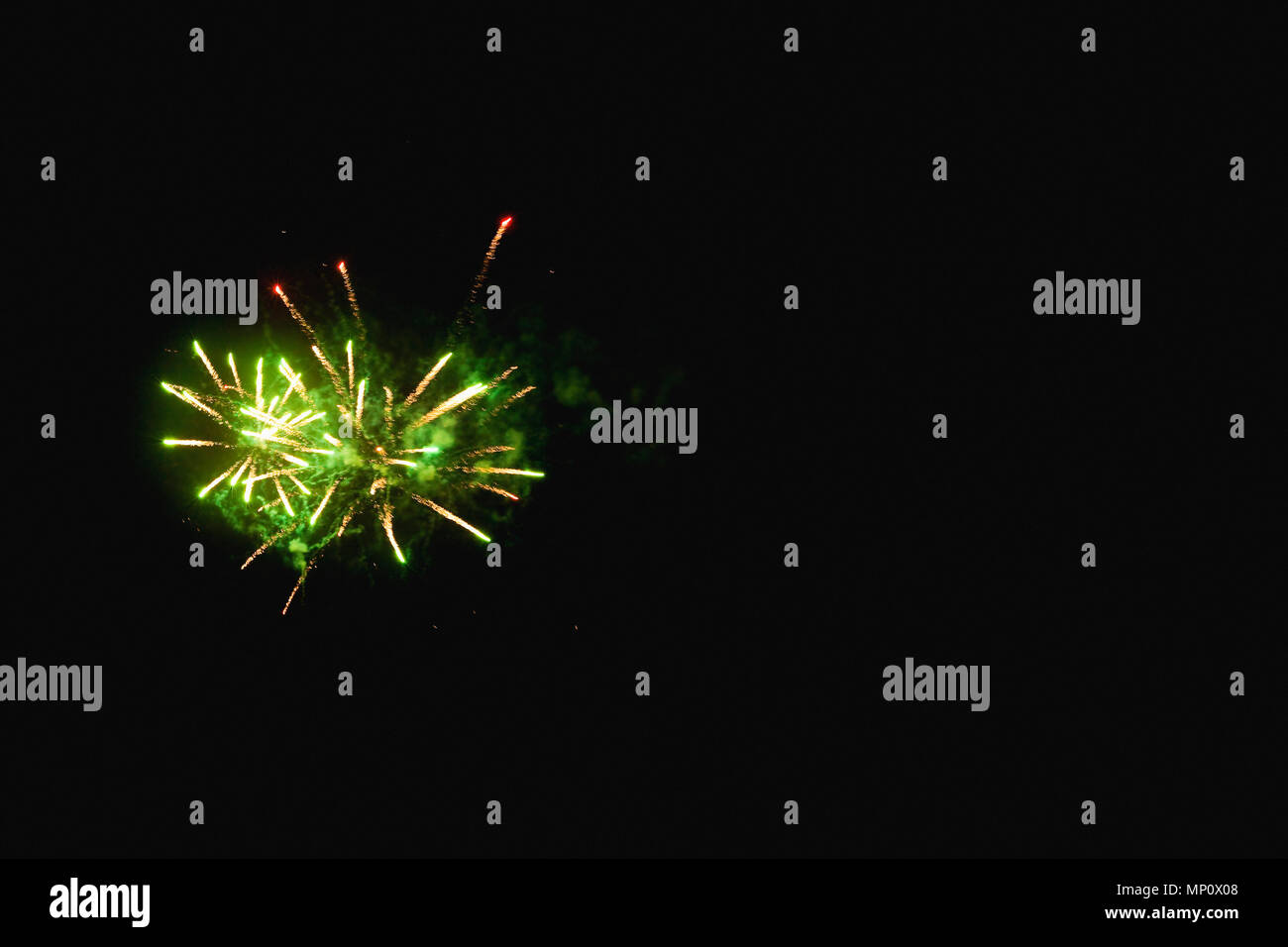 Fireworks exploding in night sky Stock Photo