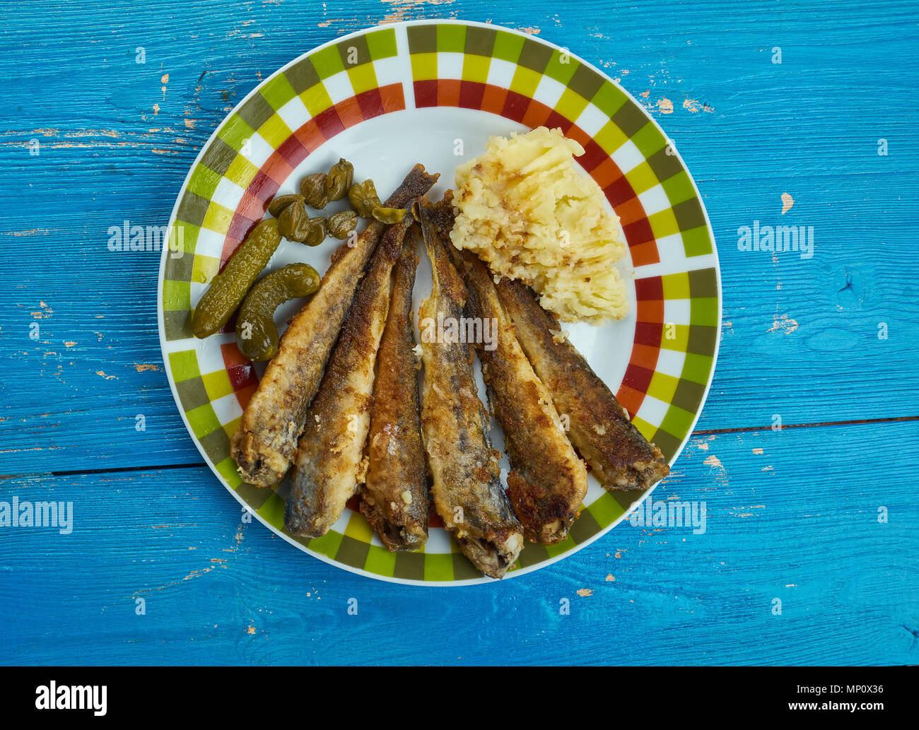 Navaga Fish Fried navaga , Fried fish with vegetable garnish Stock Photo - Alamy