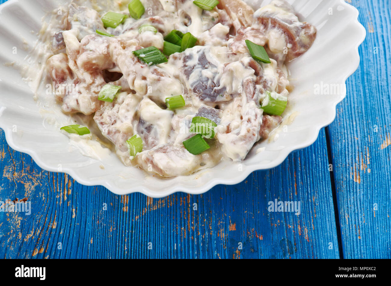 Polish Herring in Sour Cream Sledzie smietanie, close up Stock Photo