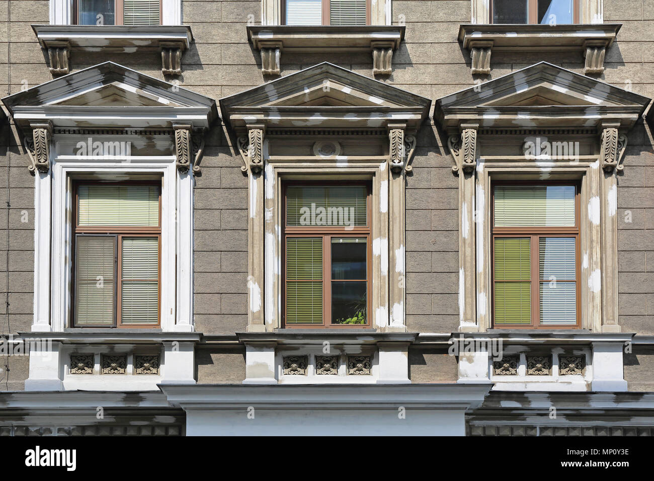 Three Windows at Classic Style Building in Vienna Stock Photo