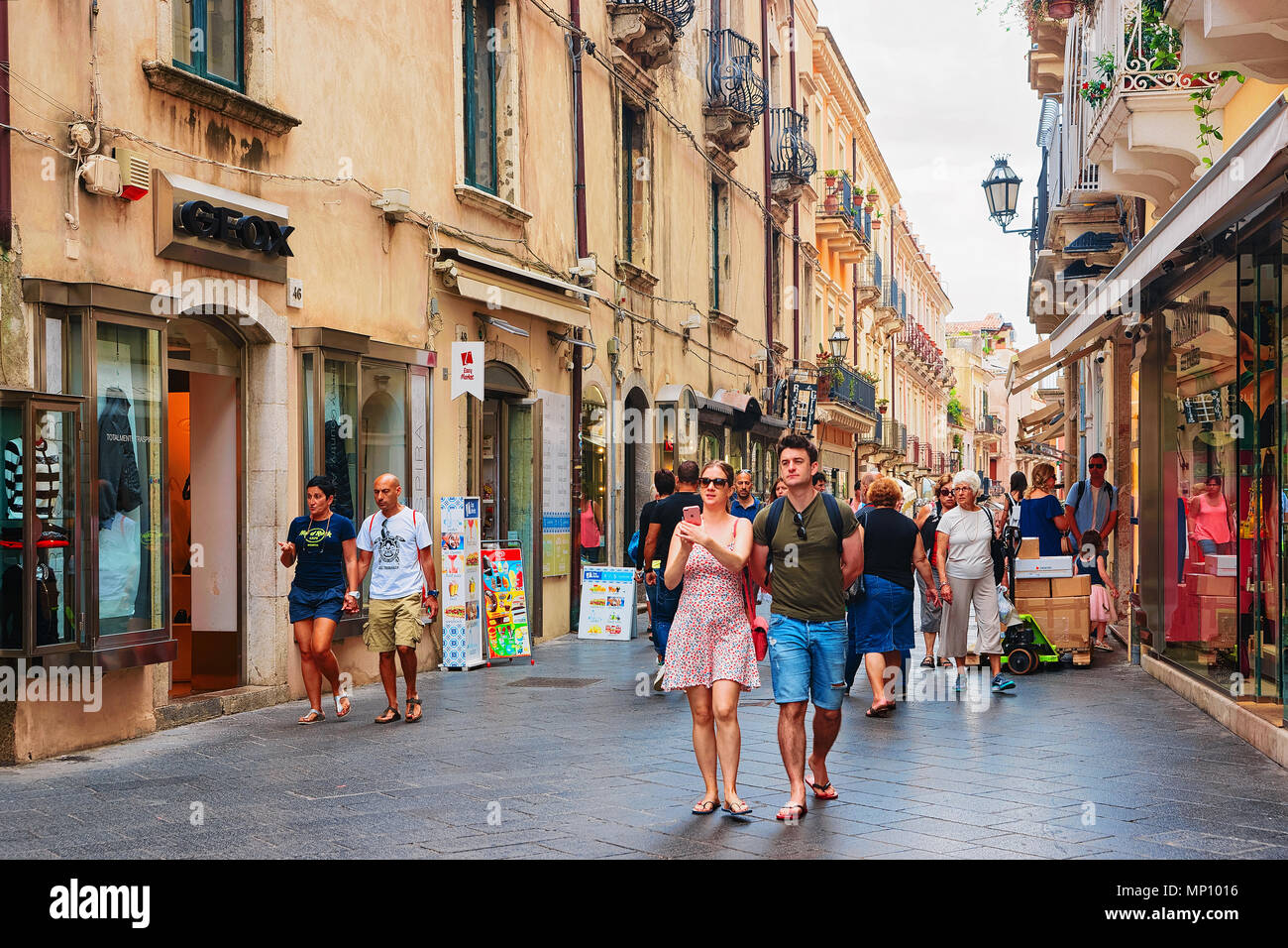 Taormina, Italy - September 25, 2017: Tourists at Corso Umberto street in Taormina, Sicily, Italy Stock Photo