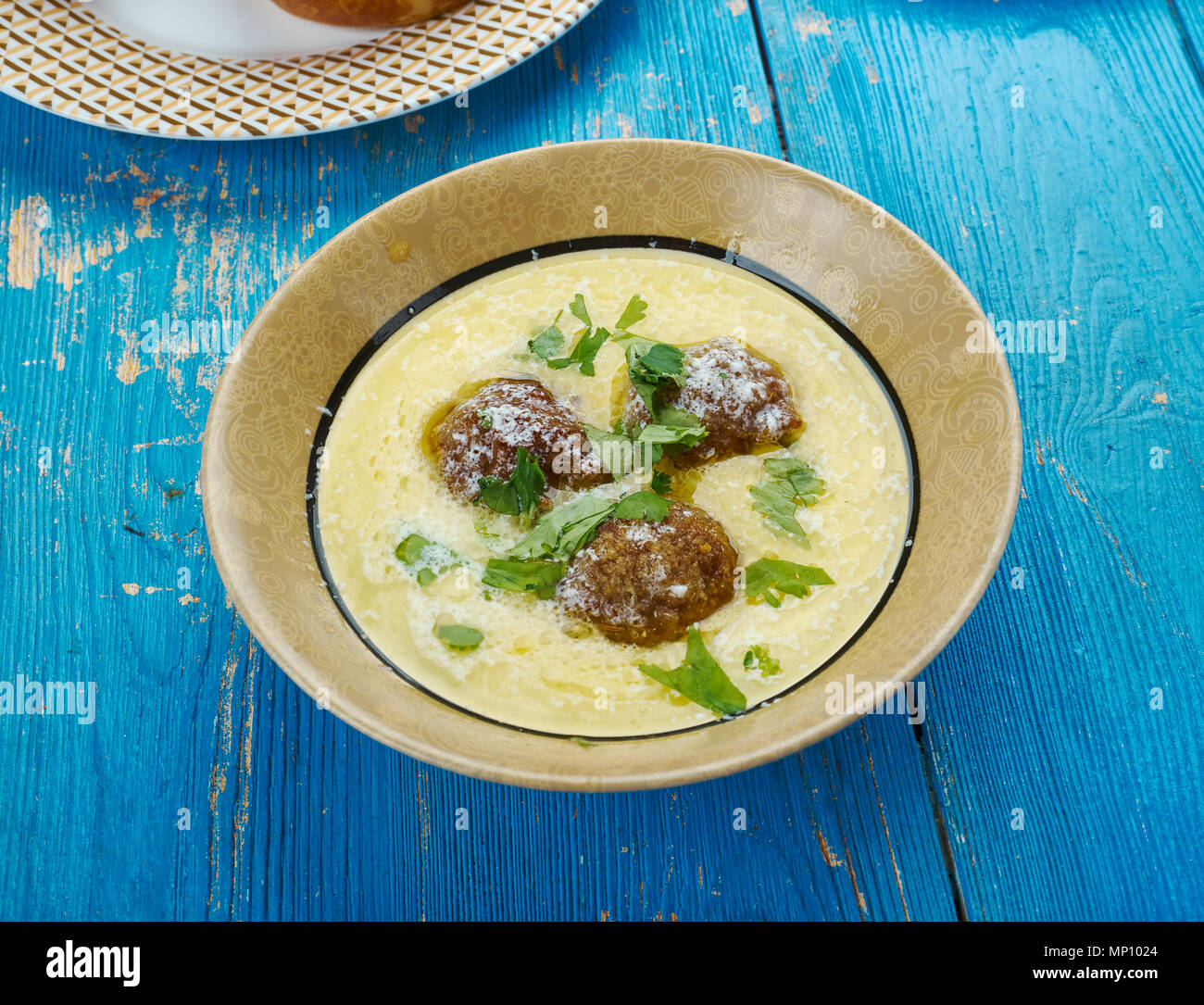 Traditional Greek Meatball Soup Giouvarlakia, close up Stock Photo