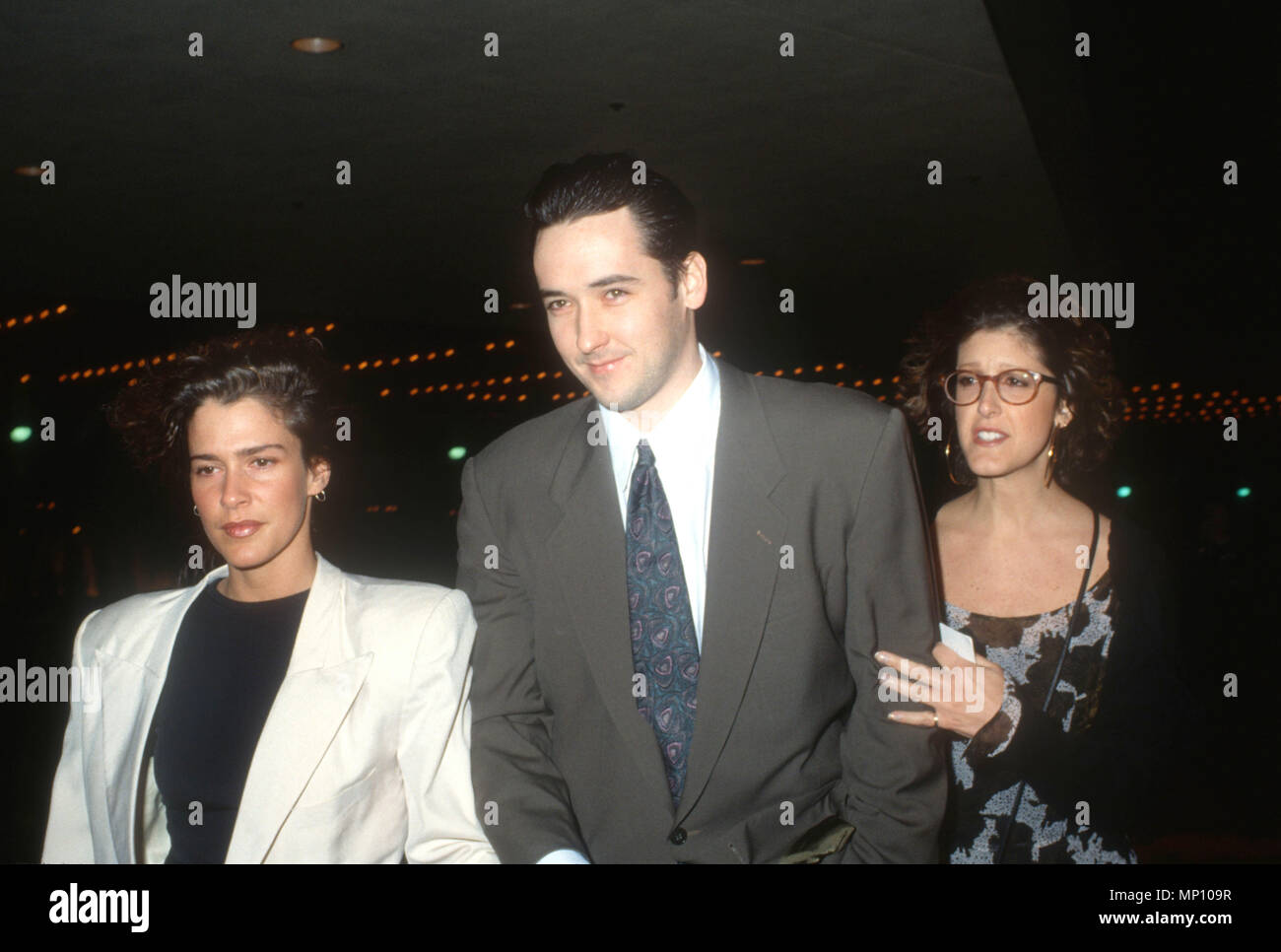 CENTURY CITY, CA - JANUARY 15: (L-R) Susannah Melvoin and actor John Cusack attend 'The Grifters' Centuy City Premiere on January 15, 1991 at Cineplex Odeon Century City Cinemas in Century City, California. Photo by Barry King/Alamy Stock Photo Stock Photo