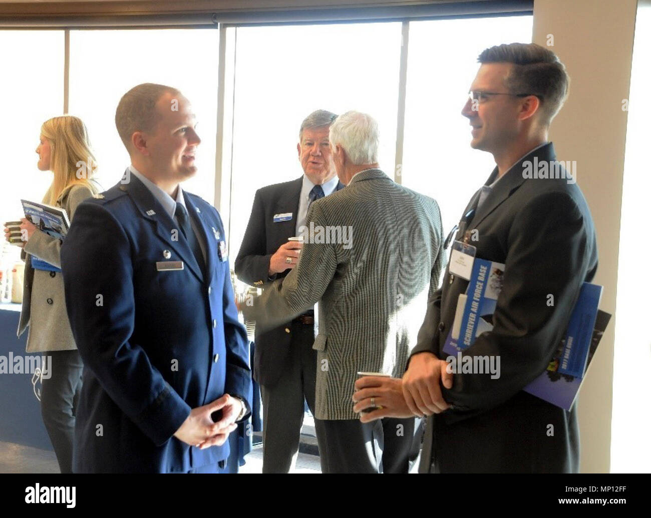 https://c8.alamy.com/comp/MP12FF/lt-col-peter-norsky-commander-of-the-2nd-space-operations-squadron-speaks-with-his-honorary-commander-john-olson-during-the-annual-state-of-the-base-at-schriever-air-force-base-colorado-march-7-2018-since-2015-state-of-the-base-has-provided-community-members-and-leaders-the-opportunity-to-learn-about-the-schriever-mission-and-strengthen-ties-MP12FF.jpg