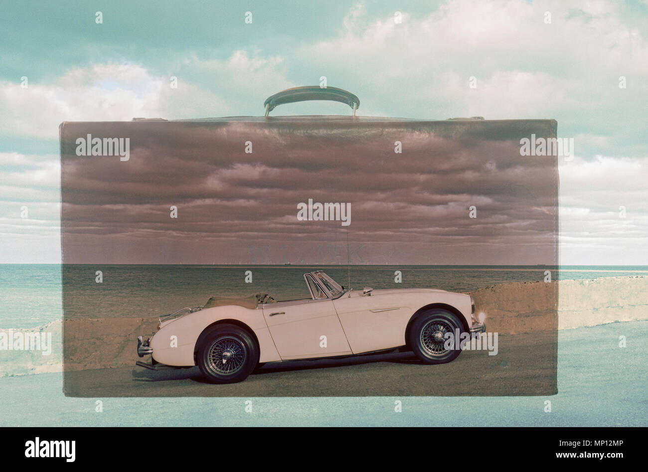 Austin Healey 3000 MKIII montage on vintage leather suitcase. Stock Photo