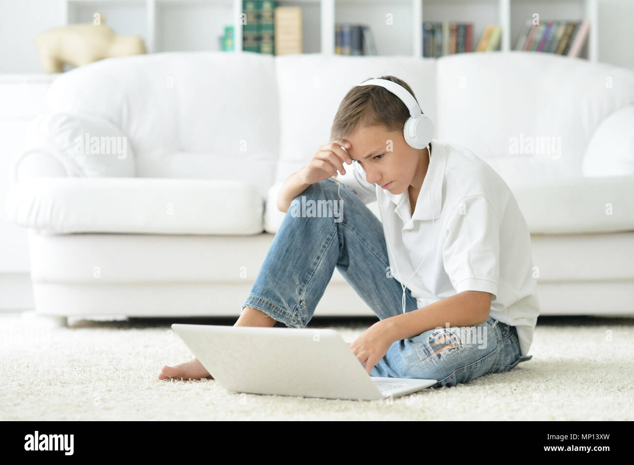 boy using modern laptop Stock Photo - Alamy