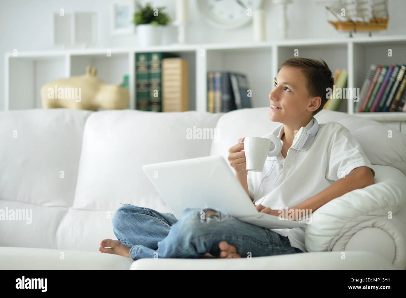 boy using modern laptop Stock Photo - Alamy