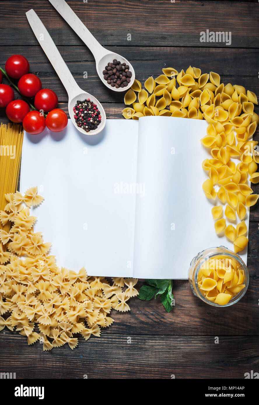 Download Spices Pasta And Vegetables Around Notebook On A Wooden Table Mockup Stock Photo Alamy