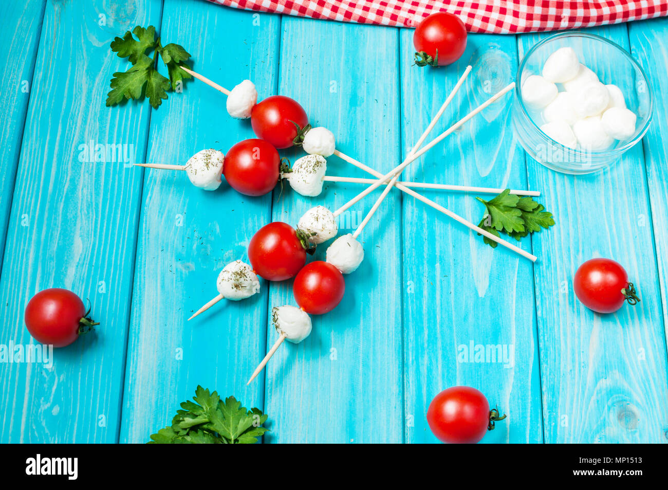 Cherry tomatoes with mozzarella on a stick Stock Photo Alamy