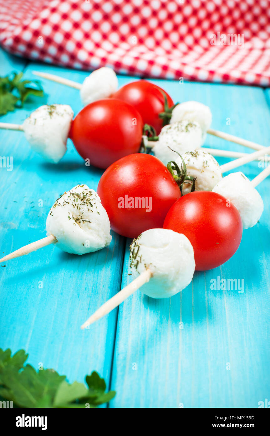Cherry tomatoes with mozzarella on a stick Stock Photo Alamy