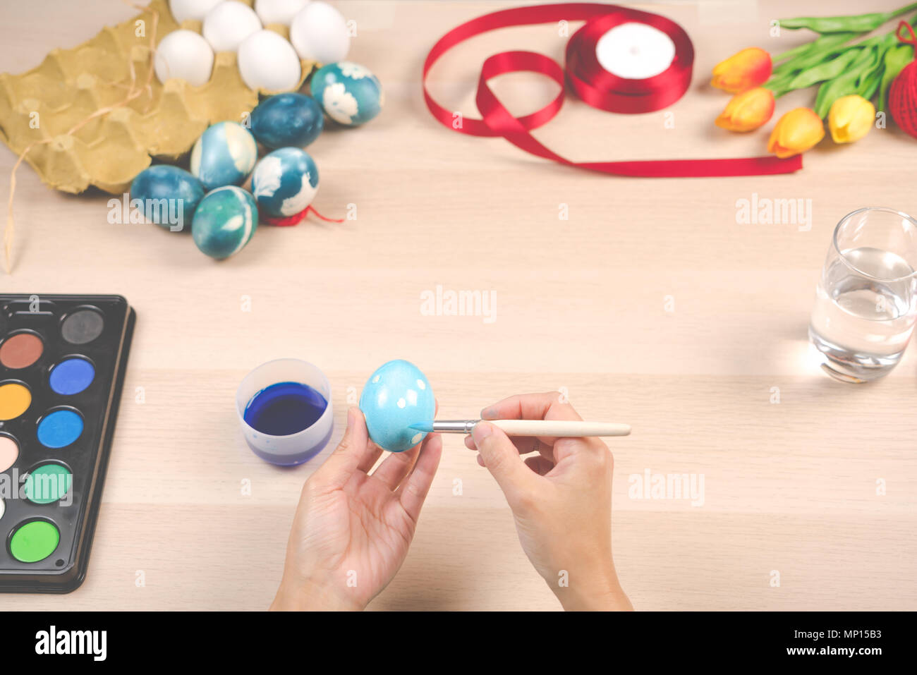 Happy easter, women is painting the easter eggs for easter day festival holiday, easter concept backgrounds with copy space Stock Photo