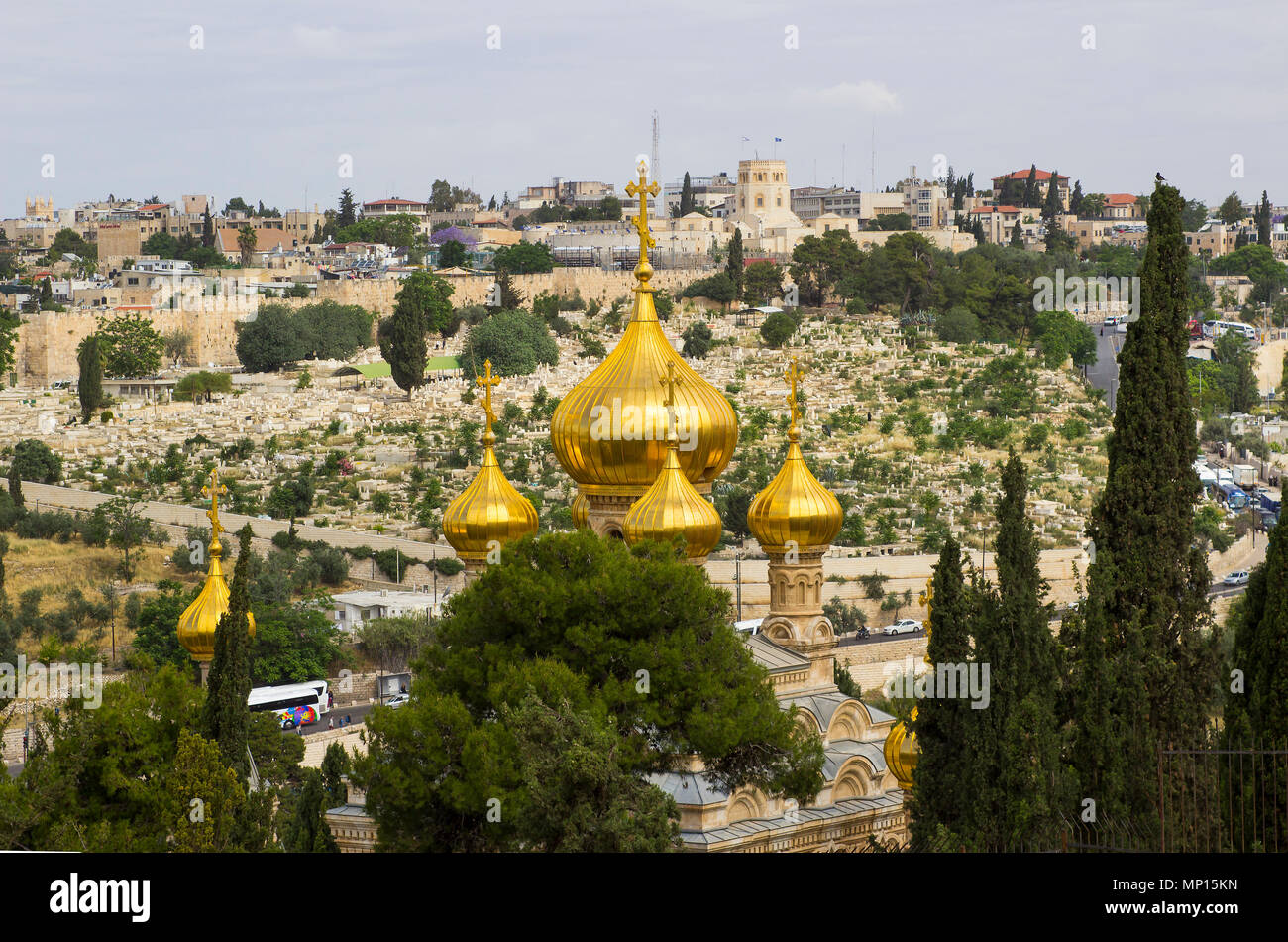 The golden rooftops of the towers on the ancient Russian Orthodox Church in the City of Jerusalem in Israel seen from the Mount of Olives Stock Photo