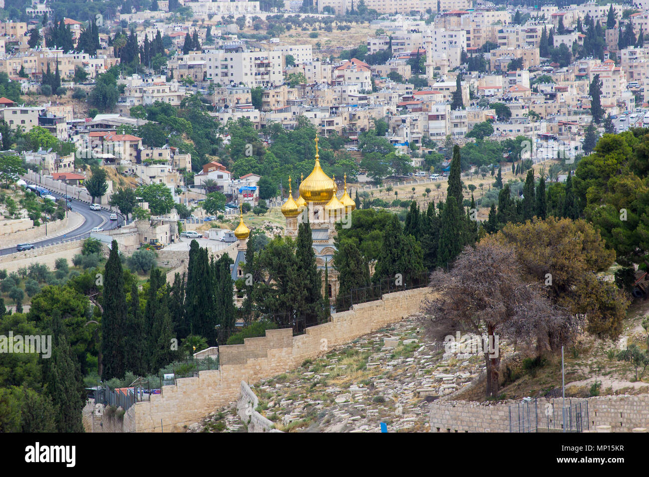 The golden rooftops of the towers on the ancient Russian Orthodox Church in the City of Jerusalem in Israel seen from the Mount of Olives Stock Photo