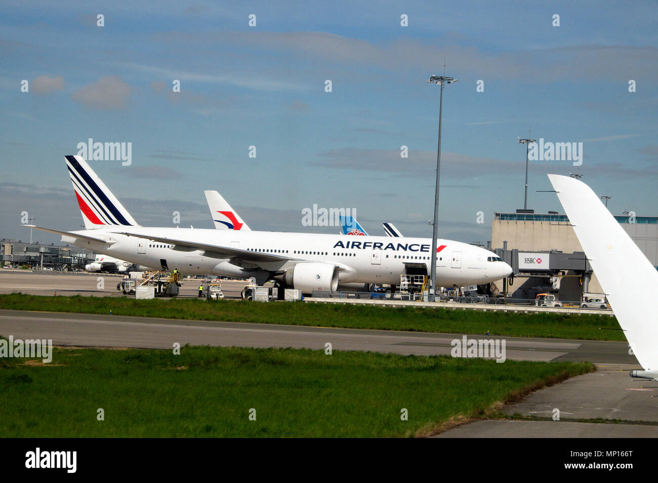 Air France aircraft planes and workers outside on the tarmac at Charles de Gaulle CDG airport during strike in April 2018 Paris France   KATHY DEWITT Stock Photo