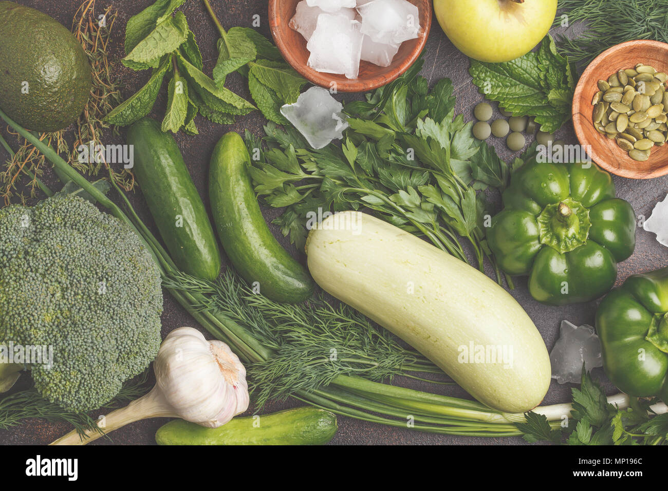 Green vegetables on a dark background. Vegetable vegan diet food ...