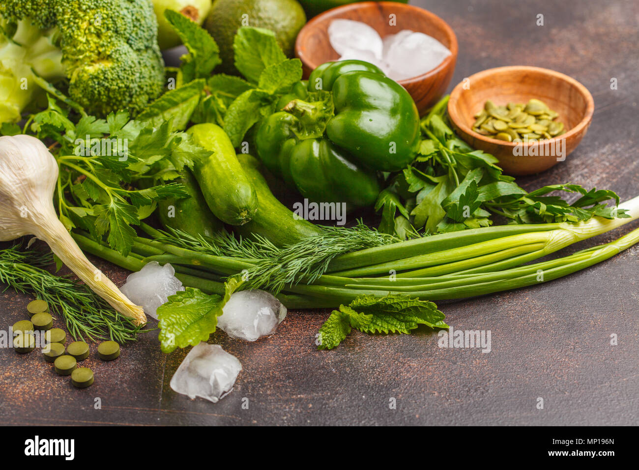 Green vegetables on a dark background. Vegetable vegan diet food ...