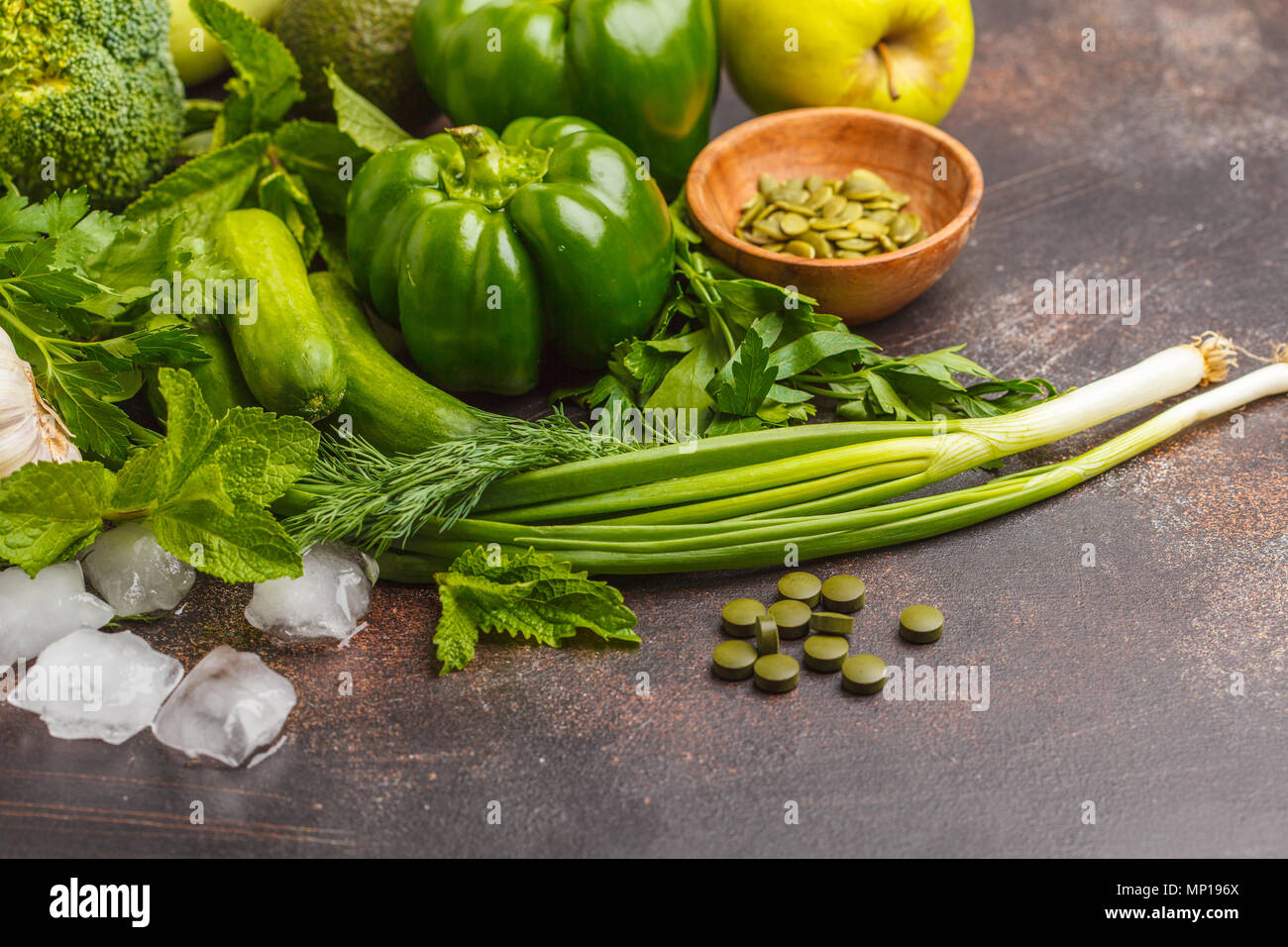 Green vegetables on a dark background. Vegetable vegan diet food ...