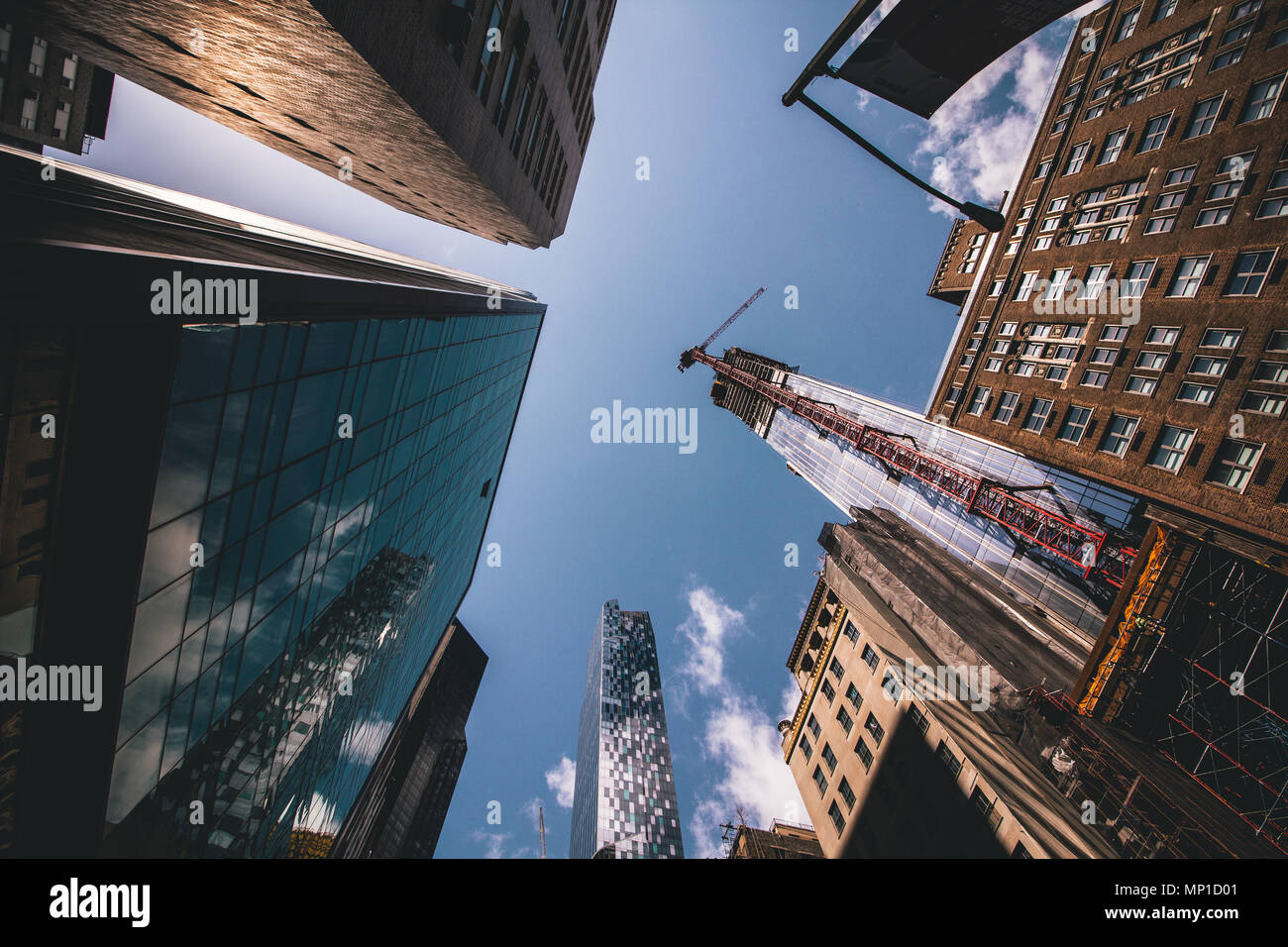 Upwards view of NYC buildings in Midtown Manhattan. Stock Photo