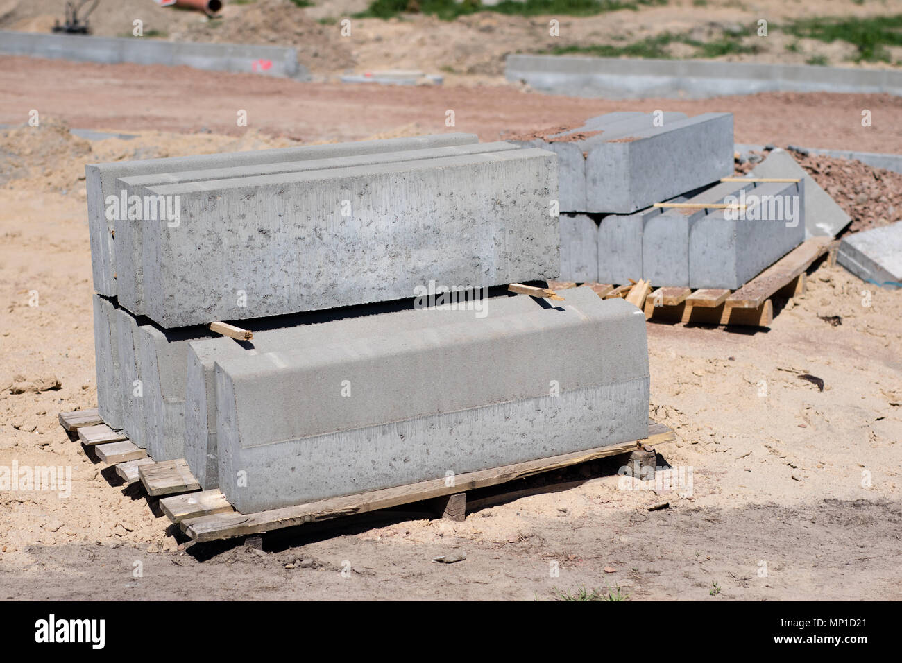 Construction site for a new road for cars. Laying paving blocks, new ...