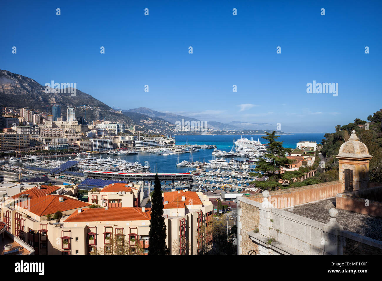 Monaco principality cityscape, view to Monte Carlo and Port Hercule on Mediterranean Sea Stock Photo