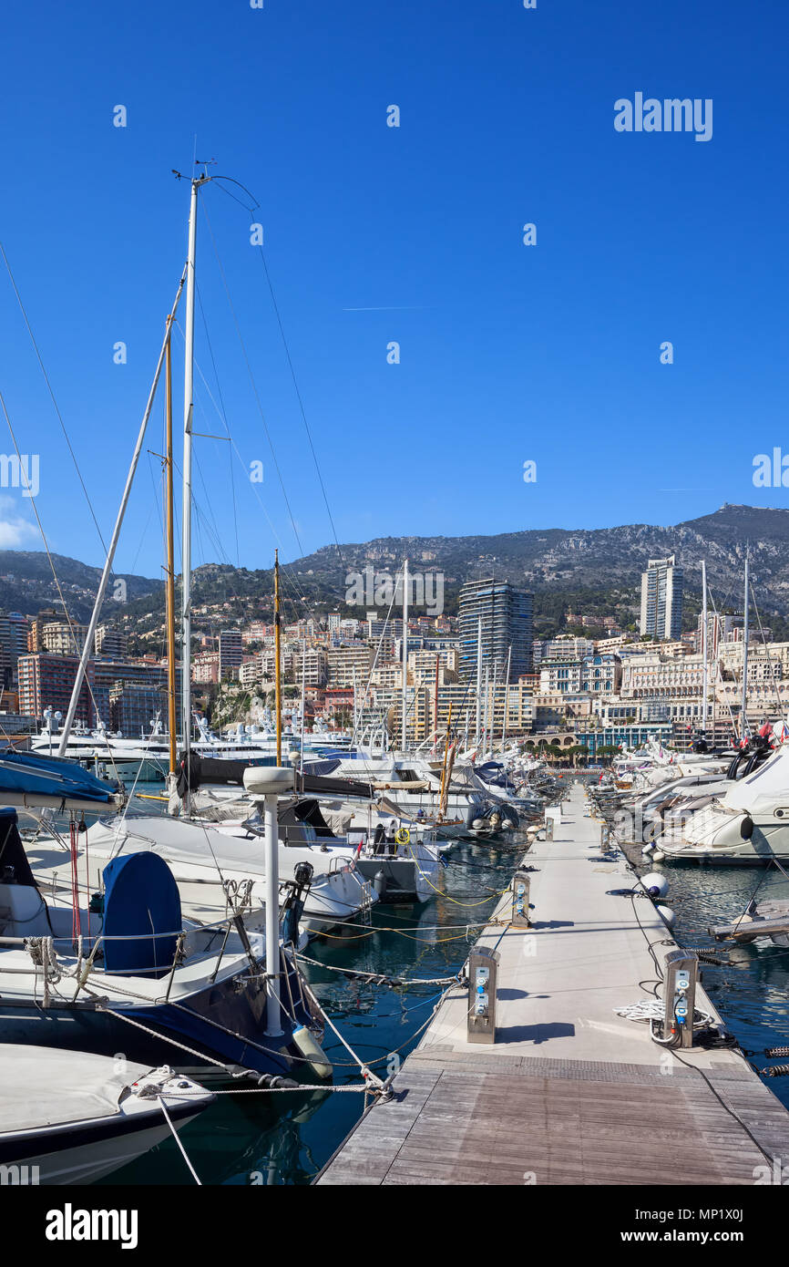 Monaco principality cityscape, view to Monte Carlo and Port Hercule on Mediterranean Sea Stock Photo