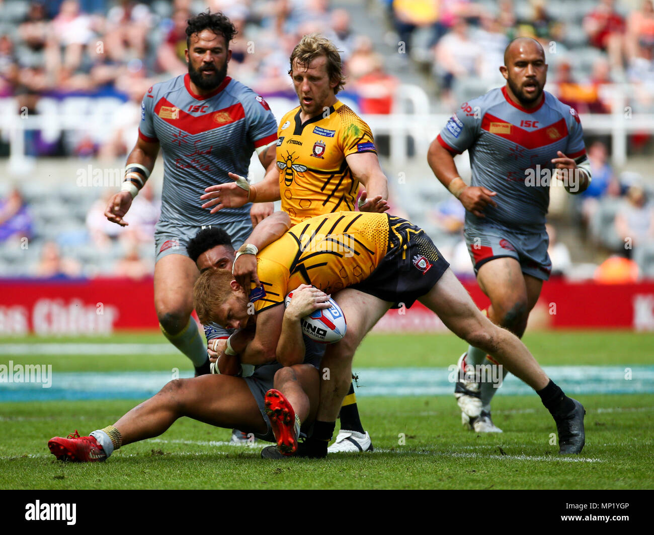 St James Park, Newcastle, UK. 20th May, 2018. Dacia Magic Weekend of Rugby League; Salford Red Devils versus Catalan Dragons; Kris Welham of Salford Red Devils is injured as Jodie Broughton of Catalan Dragons tackles him Credit: Action Plus Sports/Alamy Live News Stock Photo