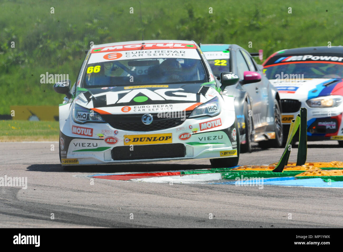 Andover, Hampshire, UK. 20th May, 2018. Josh Cook (Power Maxed TAG Racing), closely followed by Chris Smiley (BTC Norlin Racing) and Rob Collard (Team BMW/BMW Pirtek Racing), racing at Thruxton Race Circuit during the Dunlop MSA British Touring Car Championship at Thruxton Race Circuit, Andover, Hampshire, United Kingdom. With the highest average speed of any track visited by the BTCC, Thruxton's 2.4 mile circuit provides some of the biggest thrills and spills in motor sport and has earned a reputation of being a true driver's track. Credit: Michael Preston/Alamy Live News Stock Photo