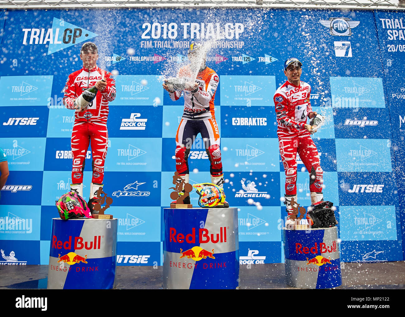 Camprodon, Girona, Spain. 20th May, 2018. FIM Trial World Championships, Spain; (L-R) Jaime Busto of the TrialGP class (2nd place), Toni Bou of the TrialGP class (1st place), and Jeroni Fajardo of the TrialGP class (3rd place) celebrate at the podium Credit: Action Plus Sports/Alamy Live News Stock Photo
