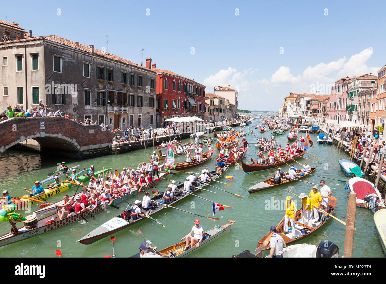 Venice, Veneto, Italy. 20th May 2018. Diversity of boats  participating in the 44th Vogalonga Regatta  rowing on the Cannaregio Canal. This is a non-competitive regatta celebrating the art of rowing and any man-powered craft may enter.  Around 2100 boats are said to have entered this year. Credit MCpics/Alamy Live News Stock Photo