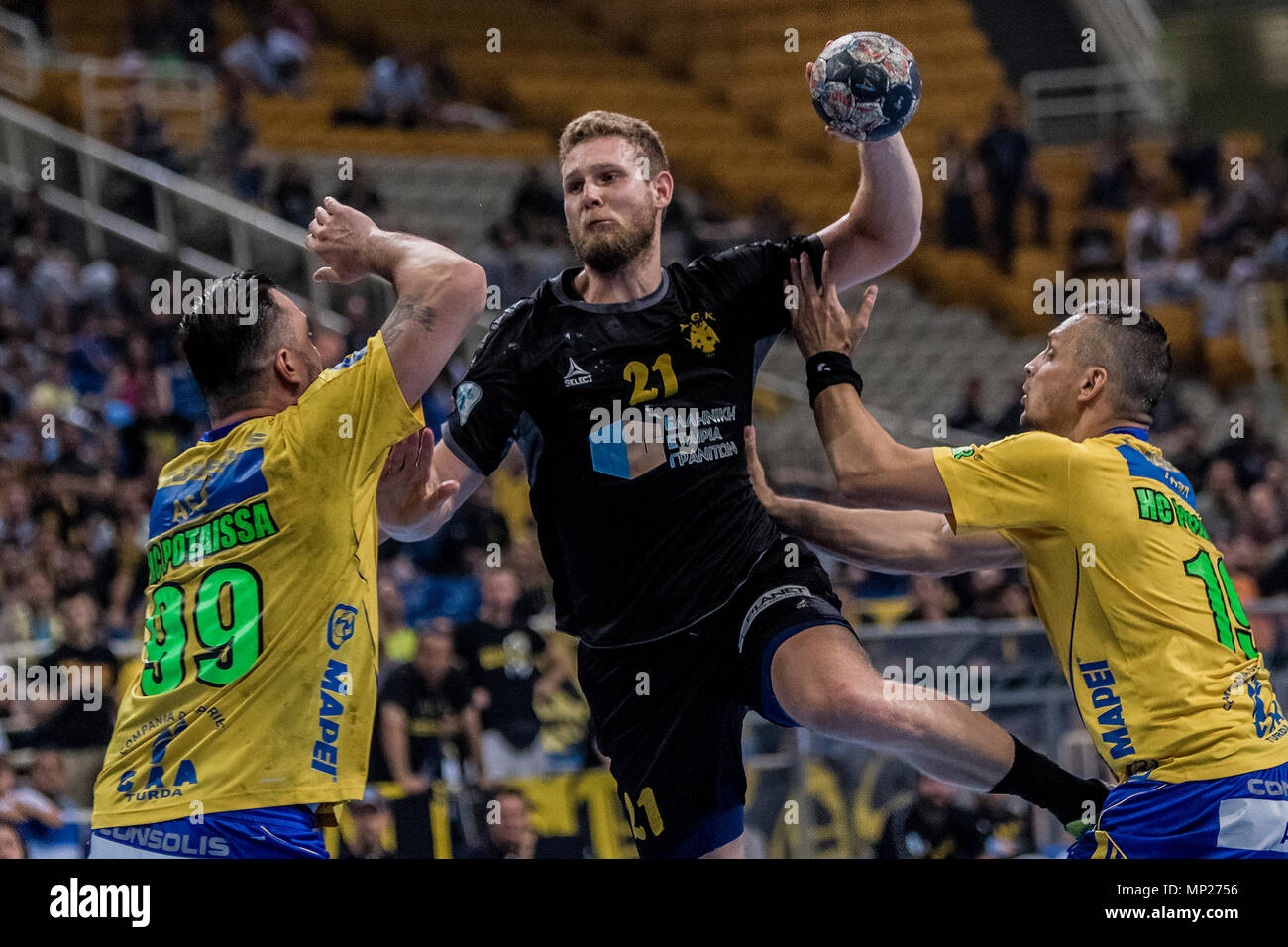 Athens, Greece. 20th May, 2018. A.E.K.'s Jonas Lokken (C) competes during  the EHF Men's Challenge Cup Finals between A.E.K. Athens and AHC Potaissa  Turda in Athens, Greece, May 20, 2018. Credit: Panagiotis