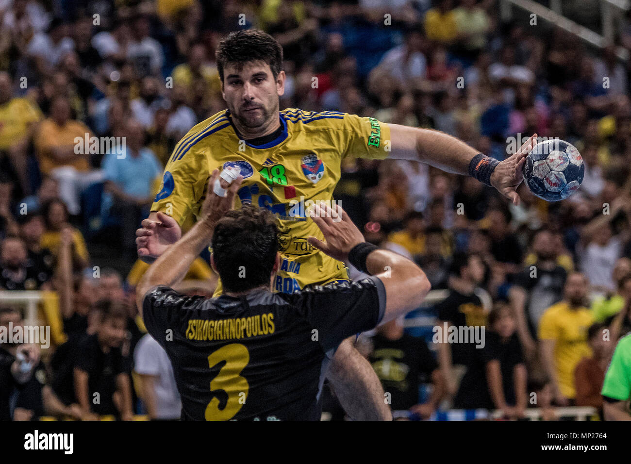 Athens, Greece. 20th May, 2018. AHC Potaissa Turda's Cristian Adomnicai (Back) competes during the EHF Men's Challenge Cup Finals between A.E.K. Athens and AHC Potaissa Turda in Athens, Greece, May 20, 2018. Credit: Panagiotis Moschandreou/Xinhua/Alamy Live News Stock Photo