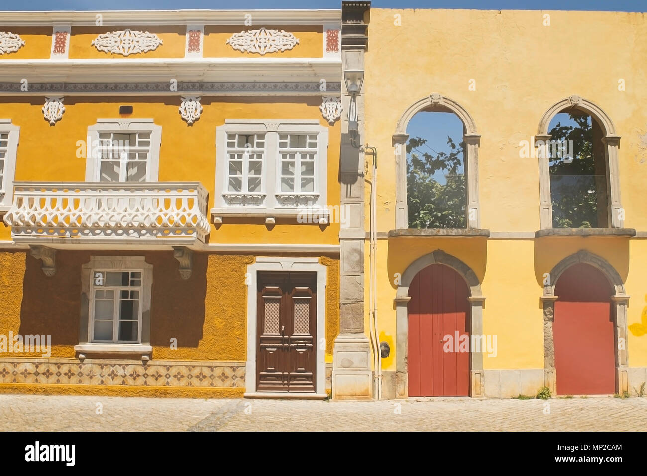 yellow houses, taviraalgarve Stock Photo Alamy