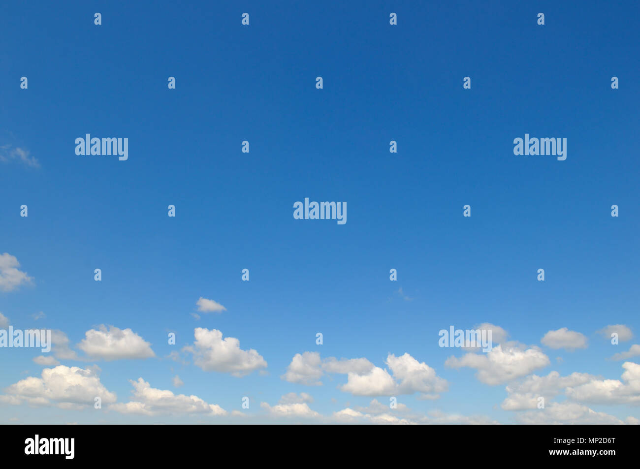 light cumulus clouds in the blue sky Stock Photo - Alamy