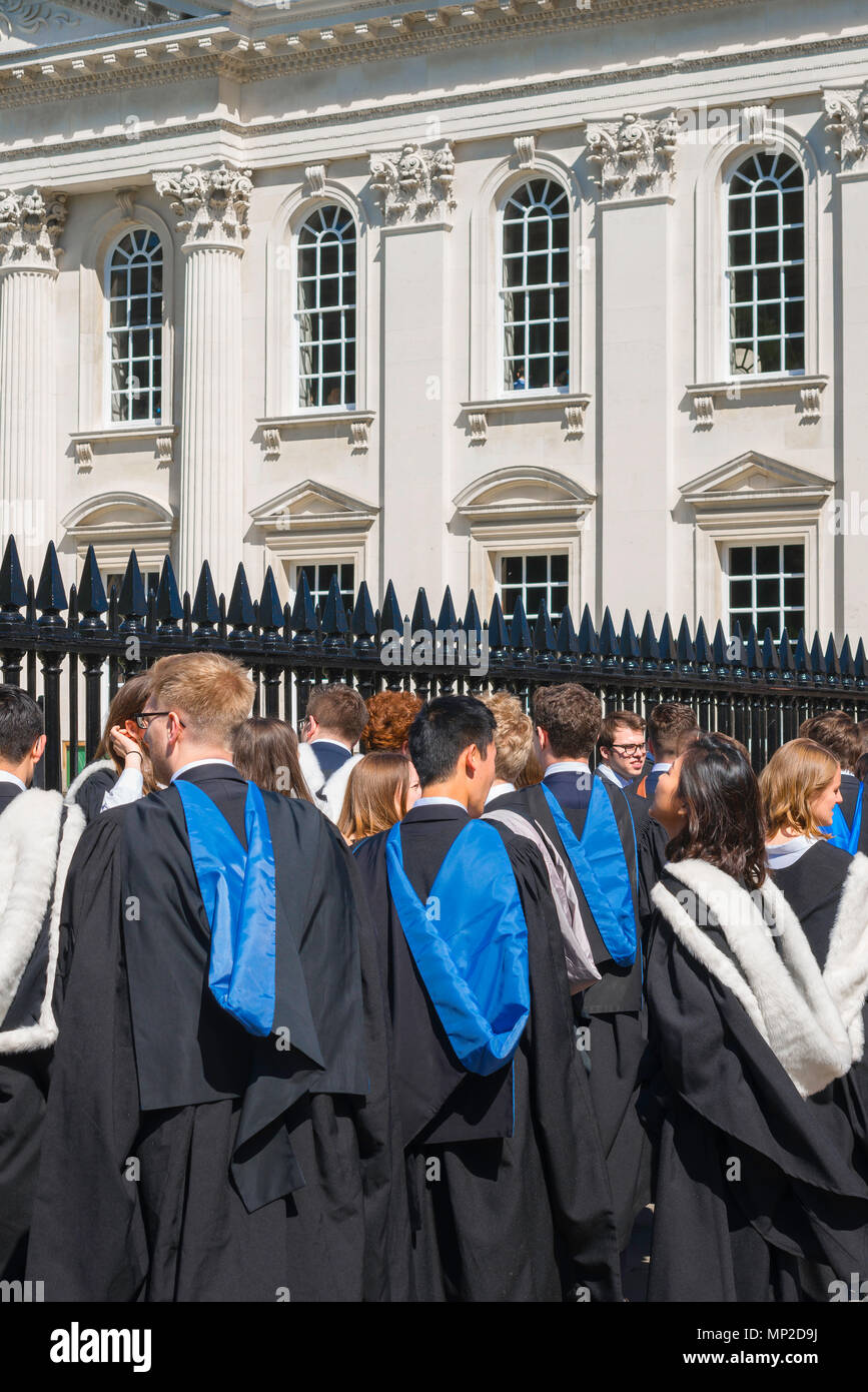 Students graduation UK, undergraduates of Cambridge University line up outside the Senate House before entering it to receive their degrees, England. Stock Photo