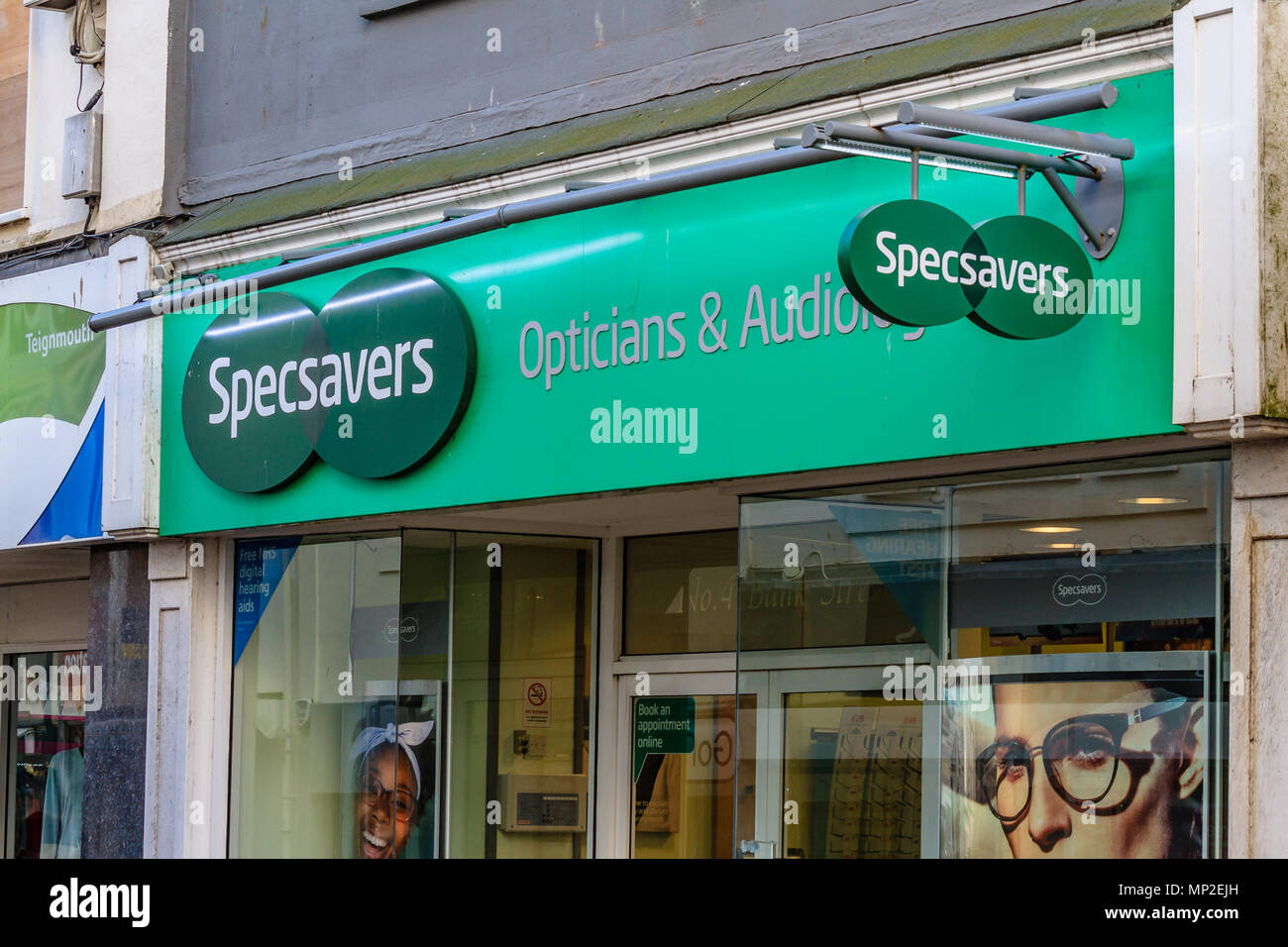 Specsavers shop sign, Teignmouth, Devon. Feb 2018. Stock Photo